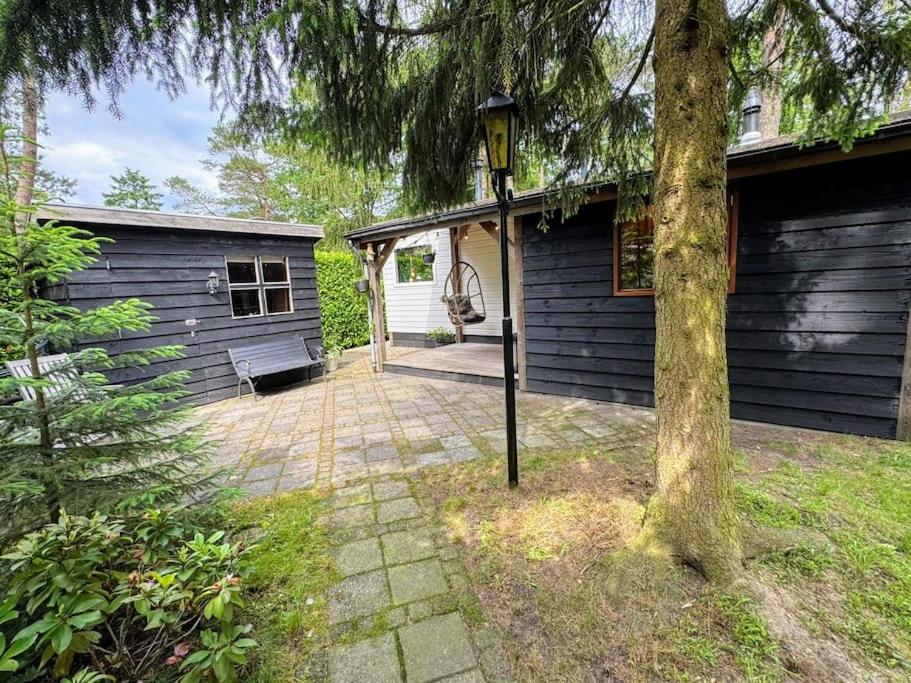 Sfeervol Chalet De Dassenburcht Emst Esterno foto